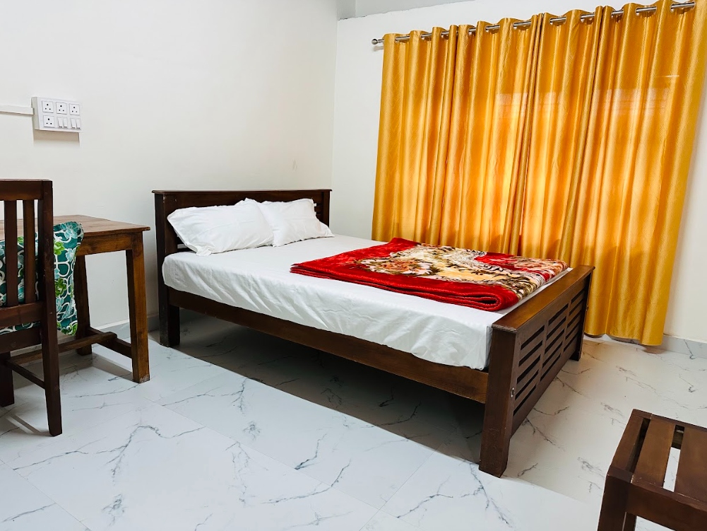 Cozy Bedroom at Munnar Town House
